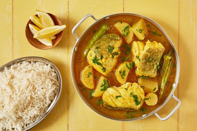 Big chunks of white fish with daikon radish, all in a soupy curry broth