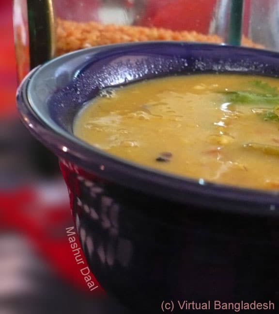 A green soupy curry made with red lentils, called a daal