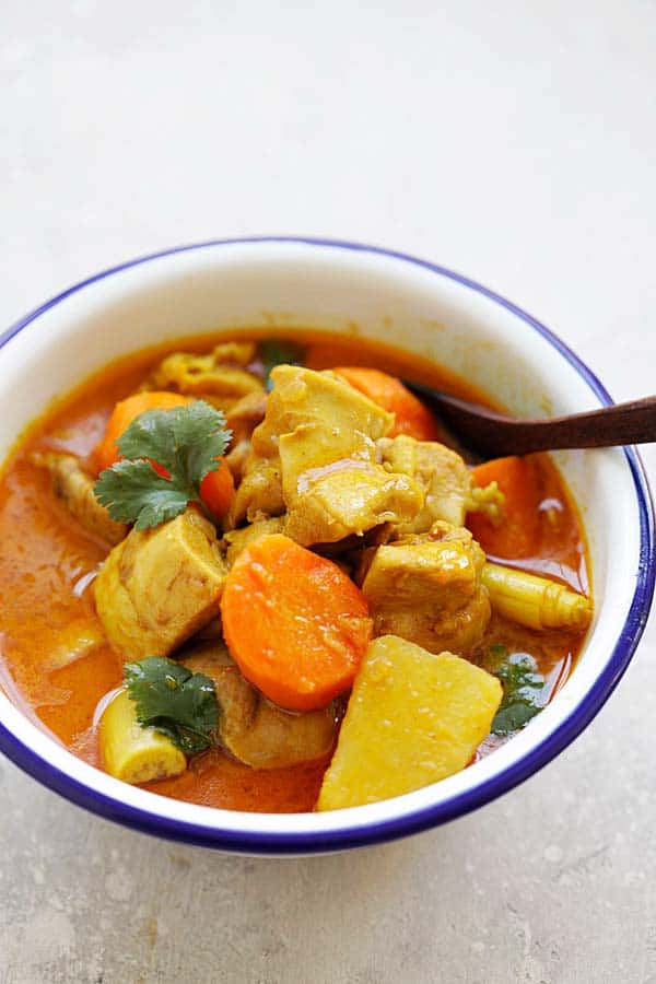 A soupy Vietnamese red curry with potatoes, carrot, onion, coriander, lemongrass, and chicken