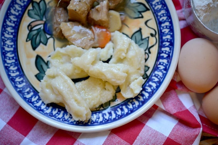 Dumplings made by dropping dough in hot water, called kluski