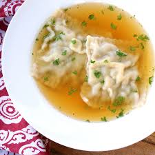German maultaschen in a clear, soupy broth