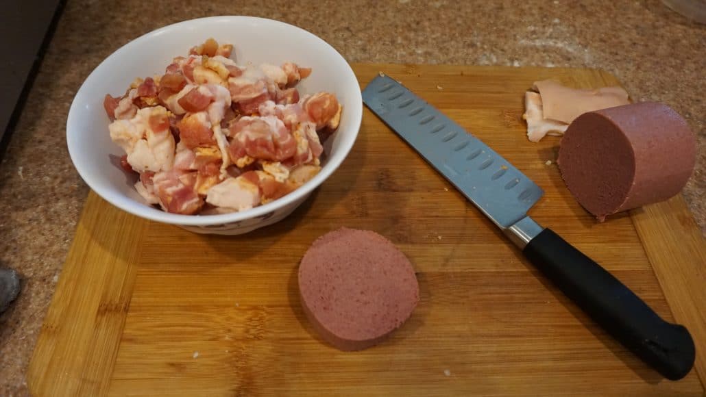 Cubed pork belly and braunschweiger in a bowl