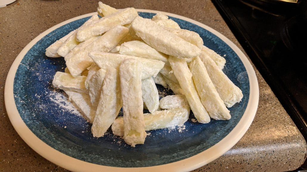Apple fries coated in a flour and cornstarch mixture
