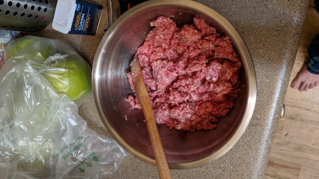Ground pork and ground beef in a bowl
