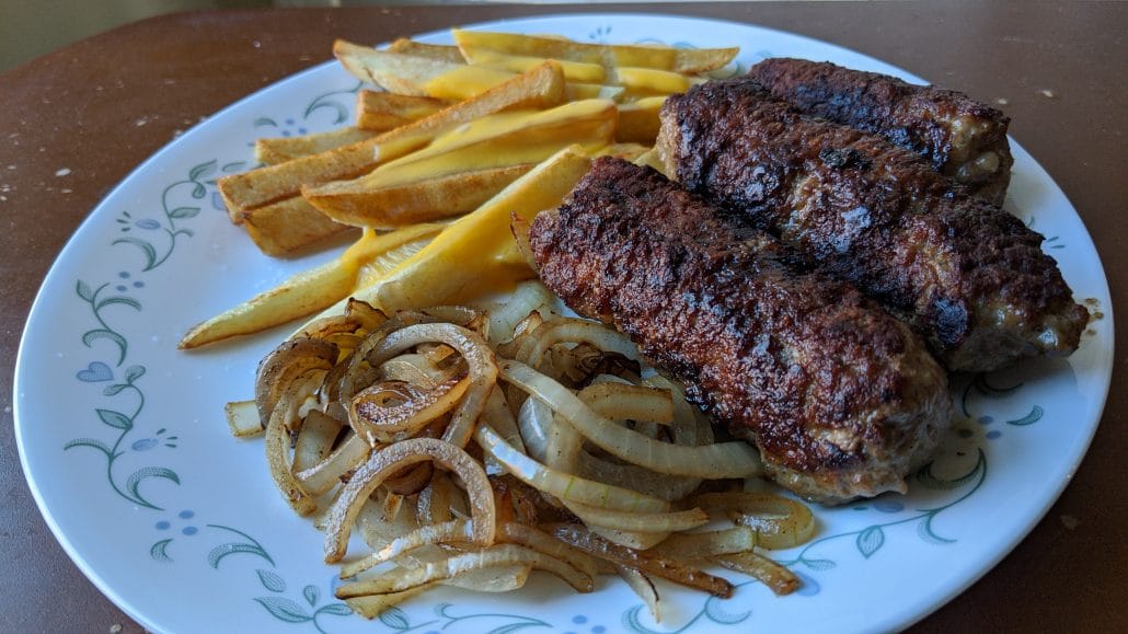 3 kebapche with grilled onions and cheese fries