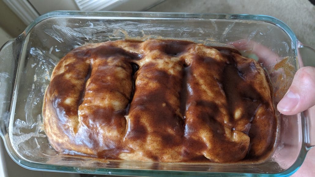 Cinnamon bread in a loaf pan before being baked