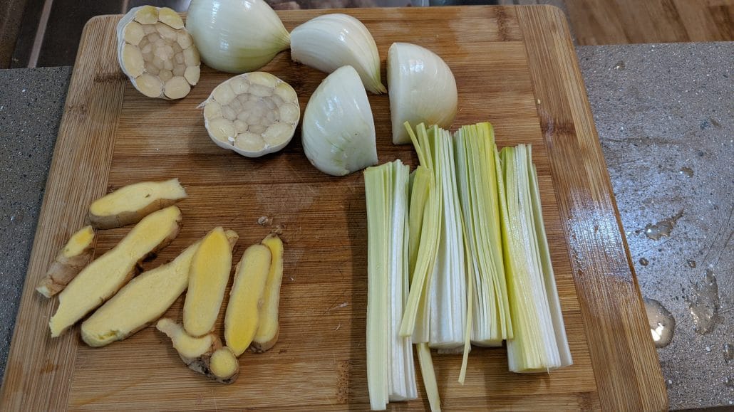 Sliced leek, onion, garlic, and ginger for the hakata ramen broth