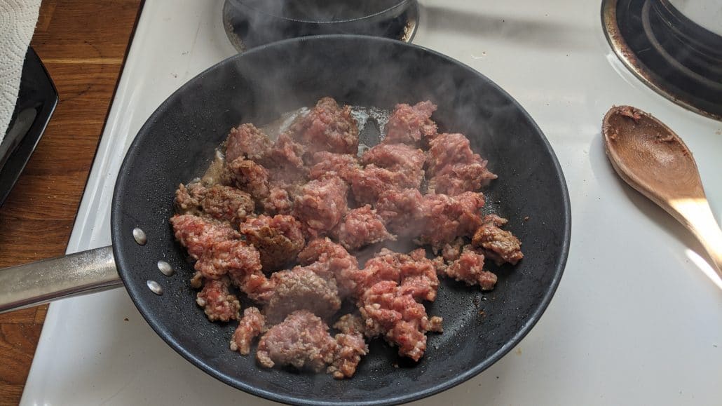 Frying ground sausage in a skillet